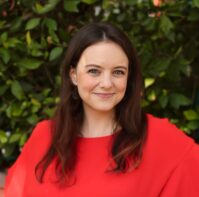 Bri Holland (She/They) bio image